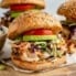 grilled chicken caesar sandwich on a board