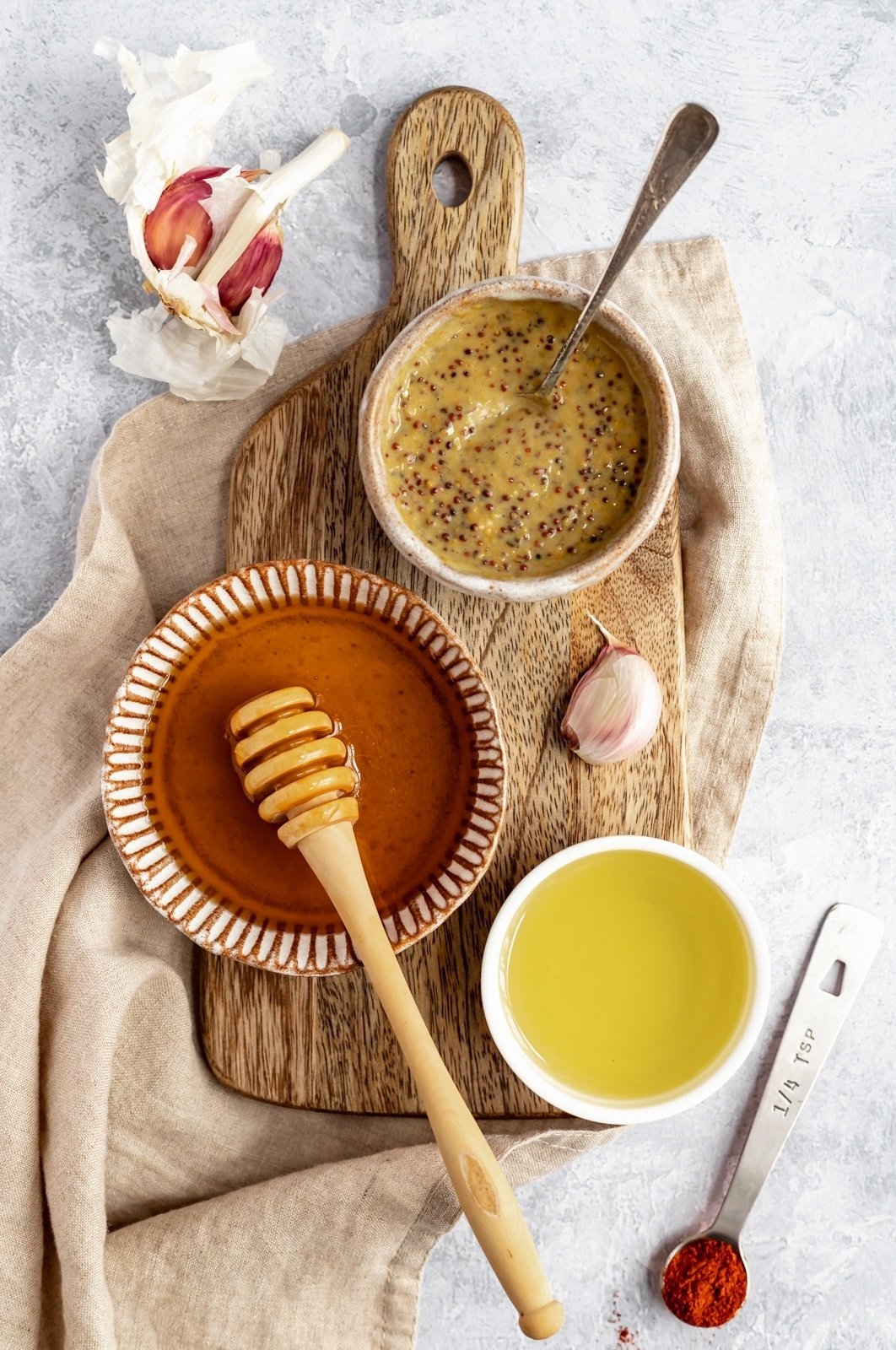 ingredients for honey mustard chicken marinade in bowls